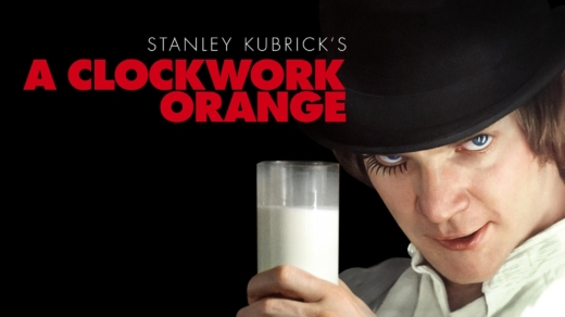 Filmposter: Hand hält ein Glas Milch vor schwarzem Hintergrund mit rotem Text 'Stanley Kubrick's A Clockwork Orange'