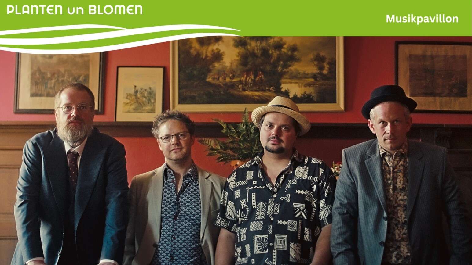 4 Personen vor einer Wand